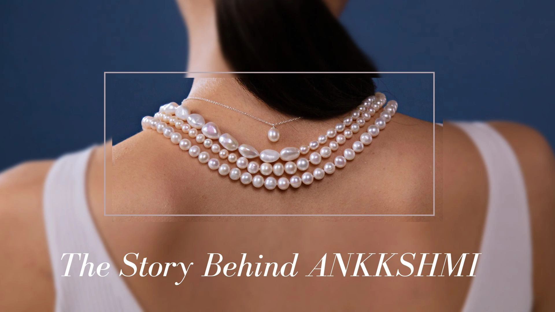 Elegant editorial image showcasing layered pearl necklaces styled on a woman with a soft luxury aesthetic, representing the story behind ANKKSHMI premium imitation jewellery brand and timeless affordable elegance for modern women.