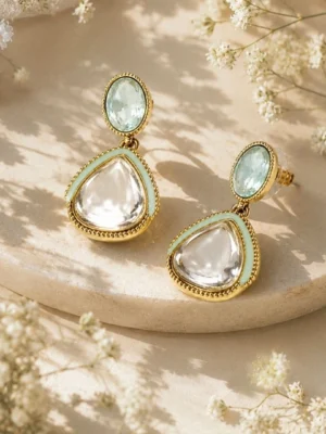 Gold-plated drop earrings featuring mint green Pachi Kundan stones and teardrop Kundan detailing